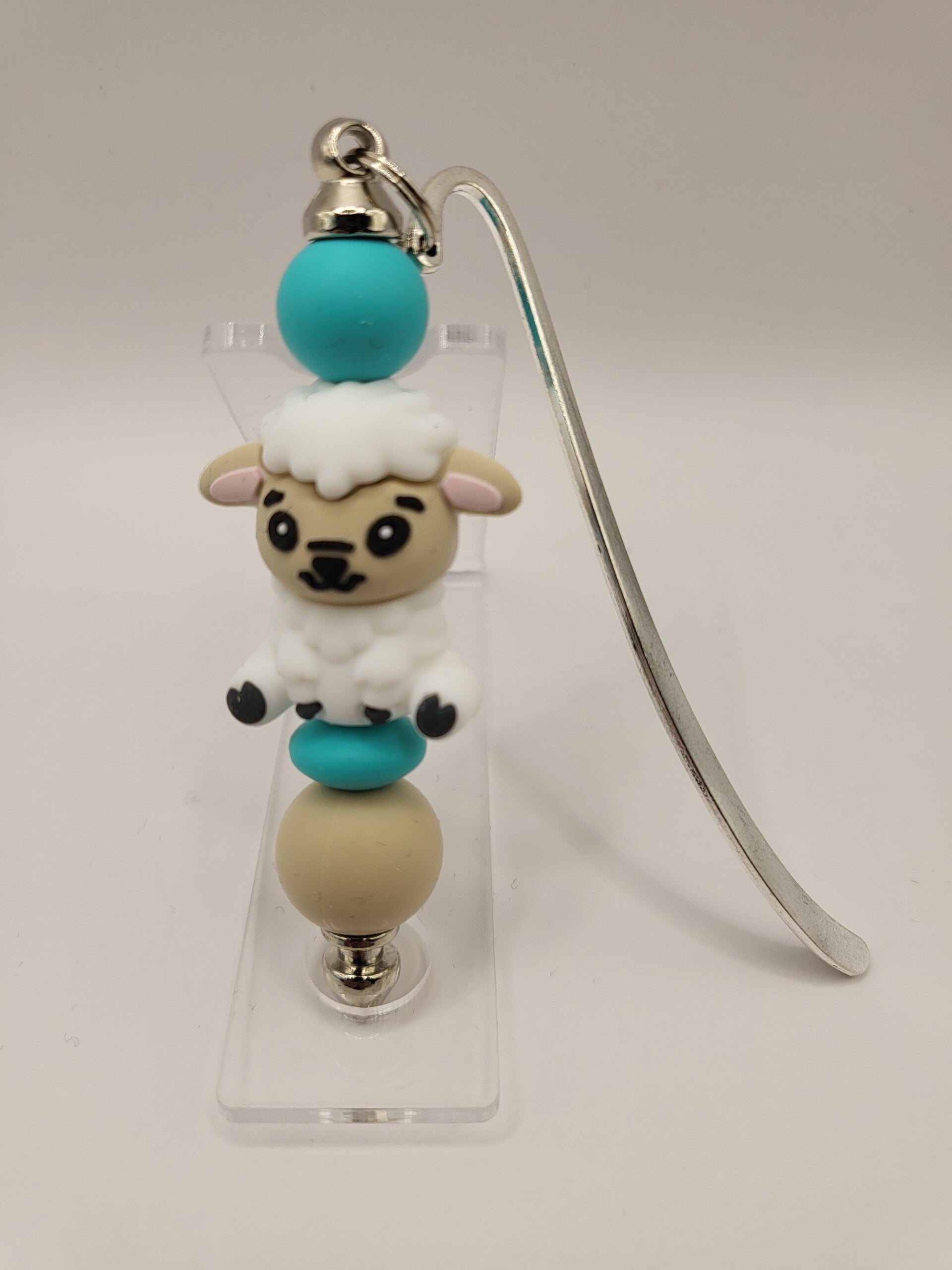 Boekenlegger met schaapje in turquoise, beige en wit