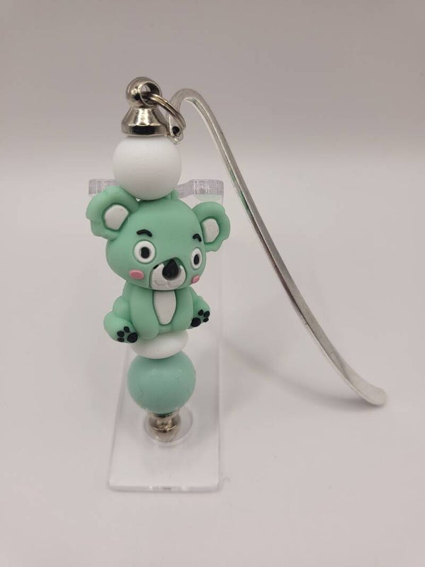 Boekenlegger met koalabeertje in mintgroen en wit.