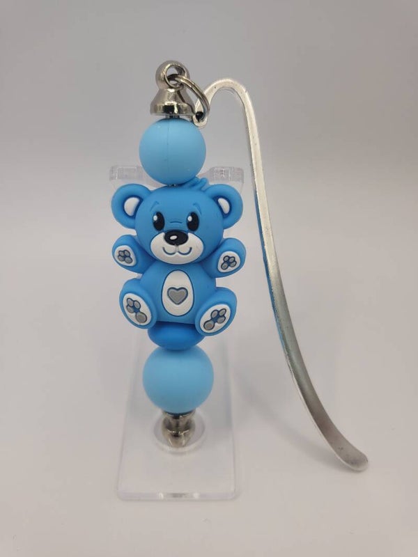 Boekenlegger met teddybeertje in kobaltblauw, zee-blauw en wit.