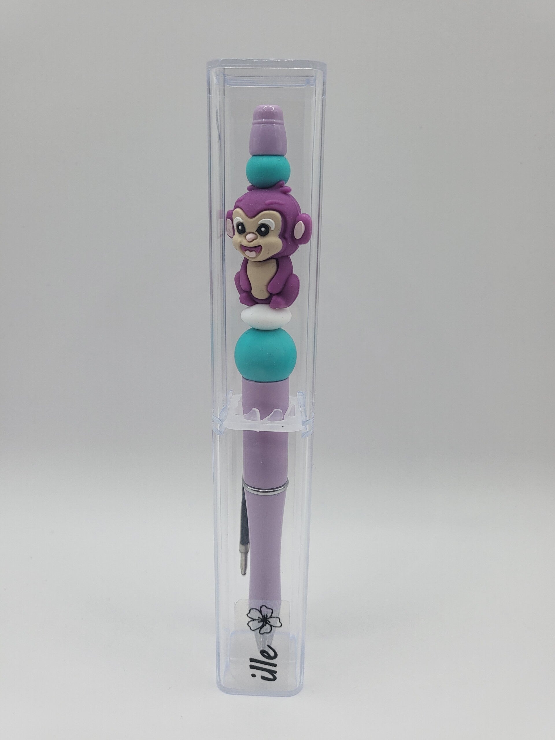 Pen met aapje in lila, turquoise en wit.