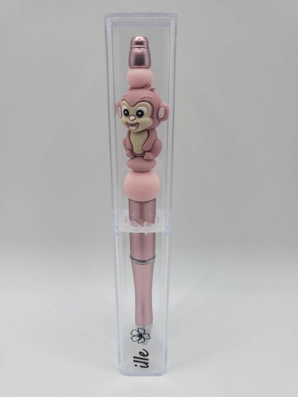 Pen met aapje in roze en oudroze.