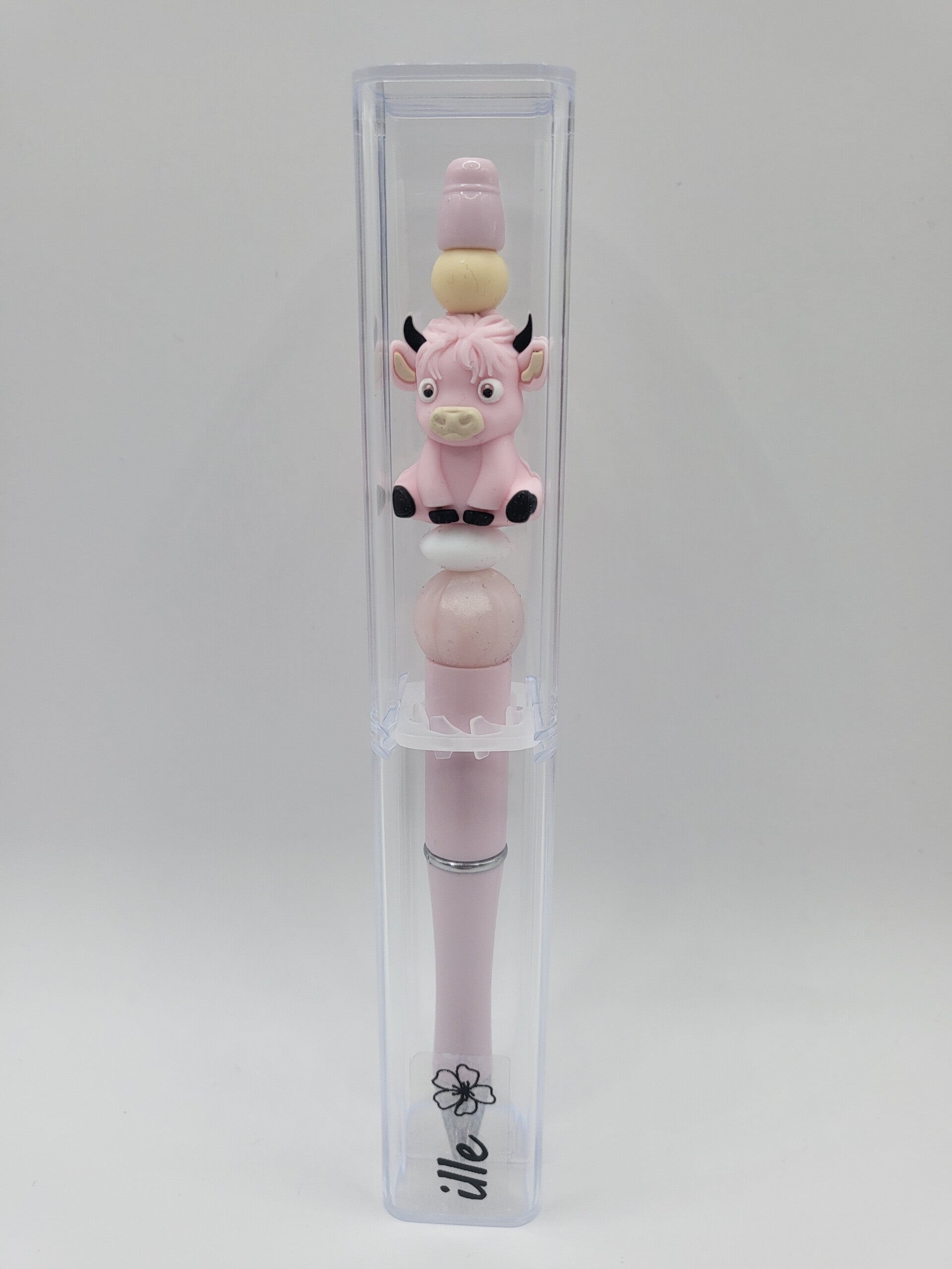 Pen met koetje in parelmoer-roze, lichtroze, lichtgeel en wit.