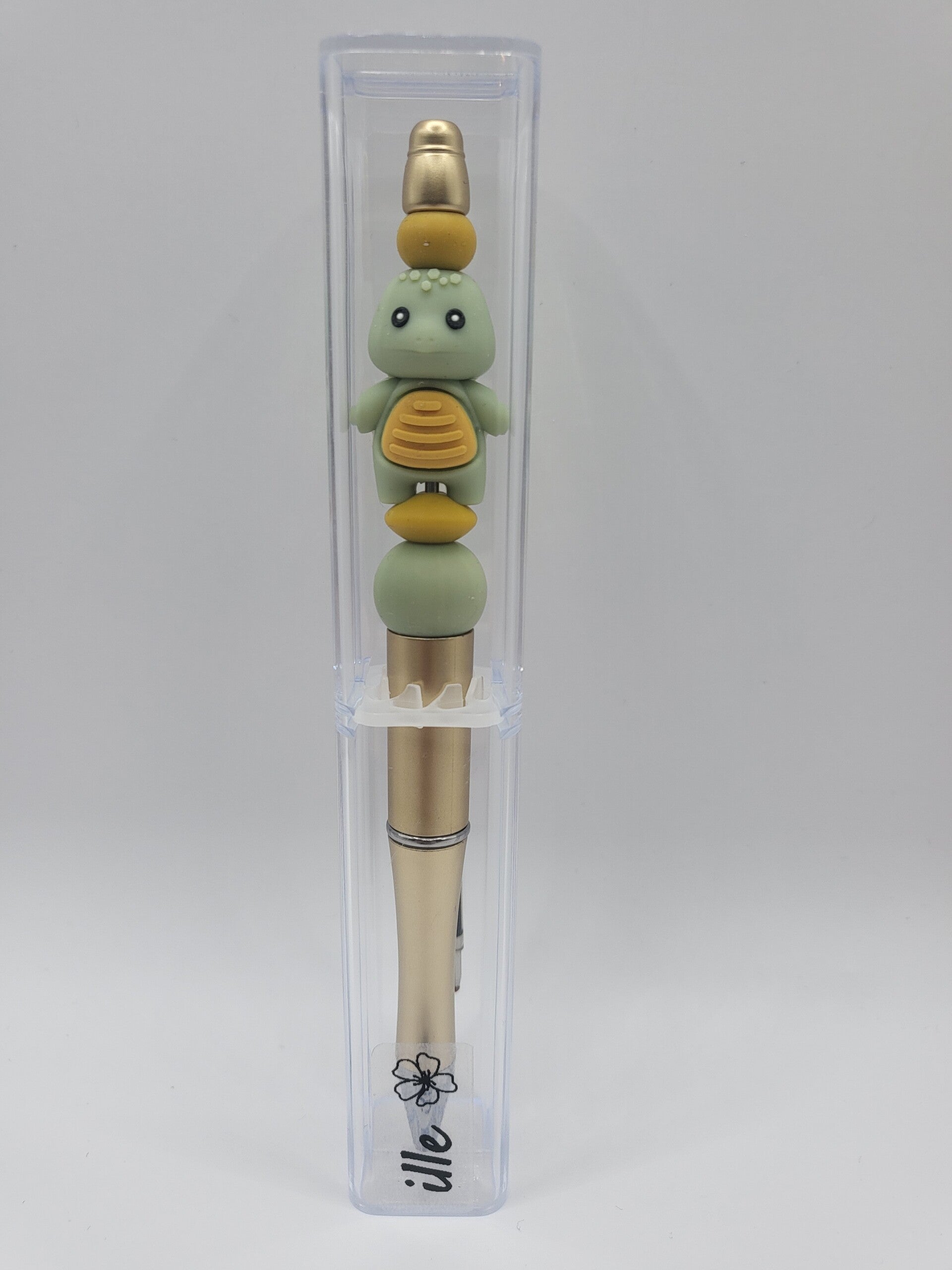 Pen met schildpadje in matcha-groen, okergeel.
