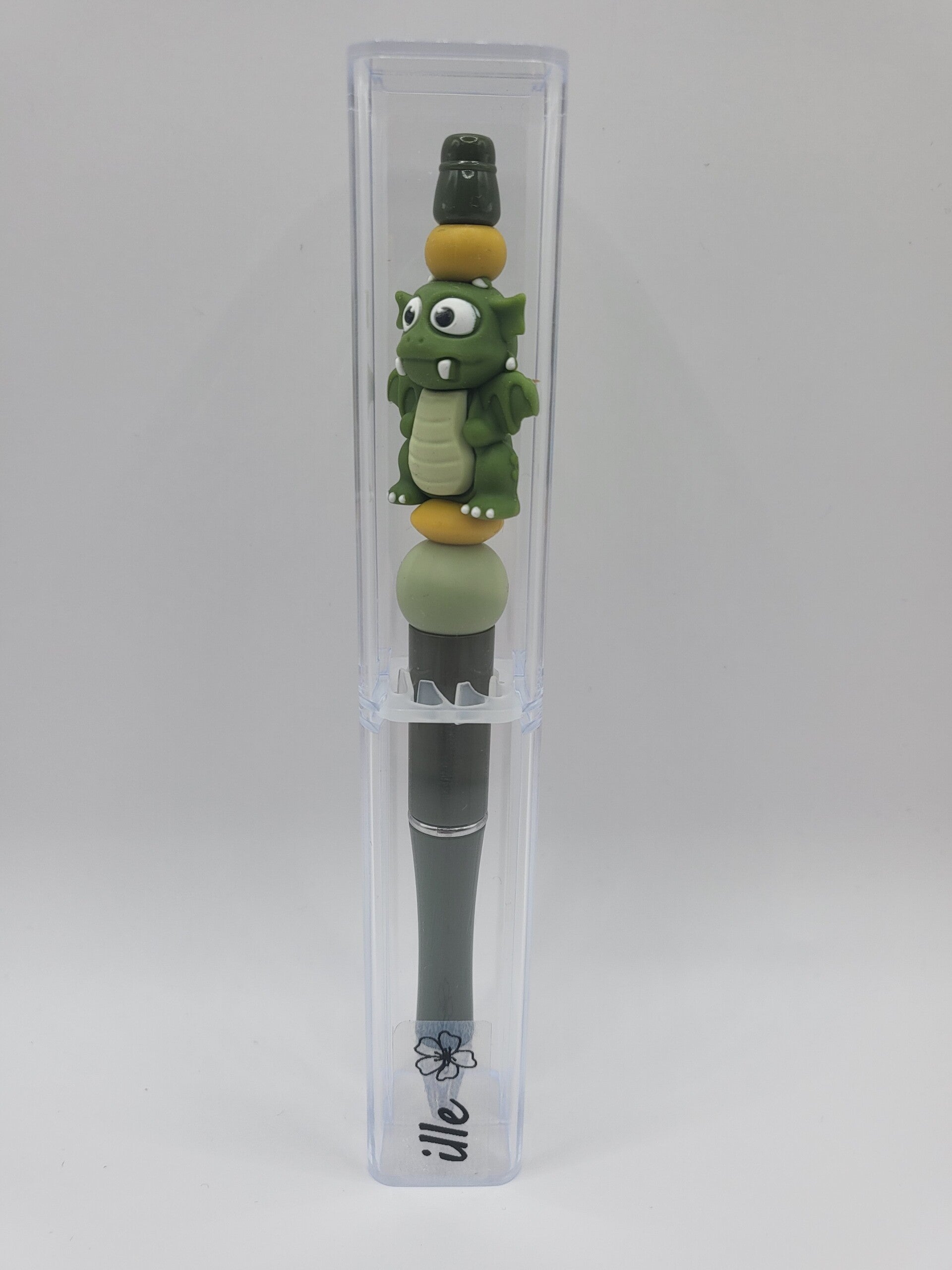 Pen met draakje in legergroen, matcha-groen en okergeel.