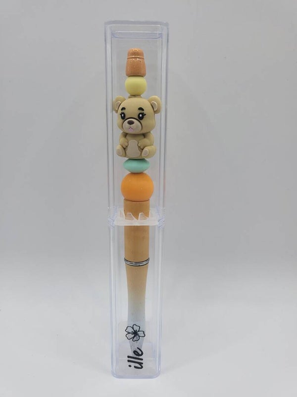 Pen met beertje in mintgroen, oranje, lichtgeel en beige.