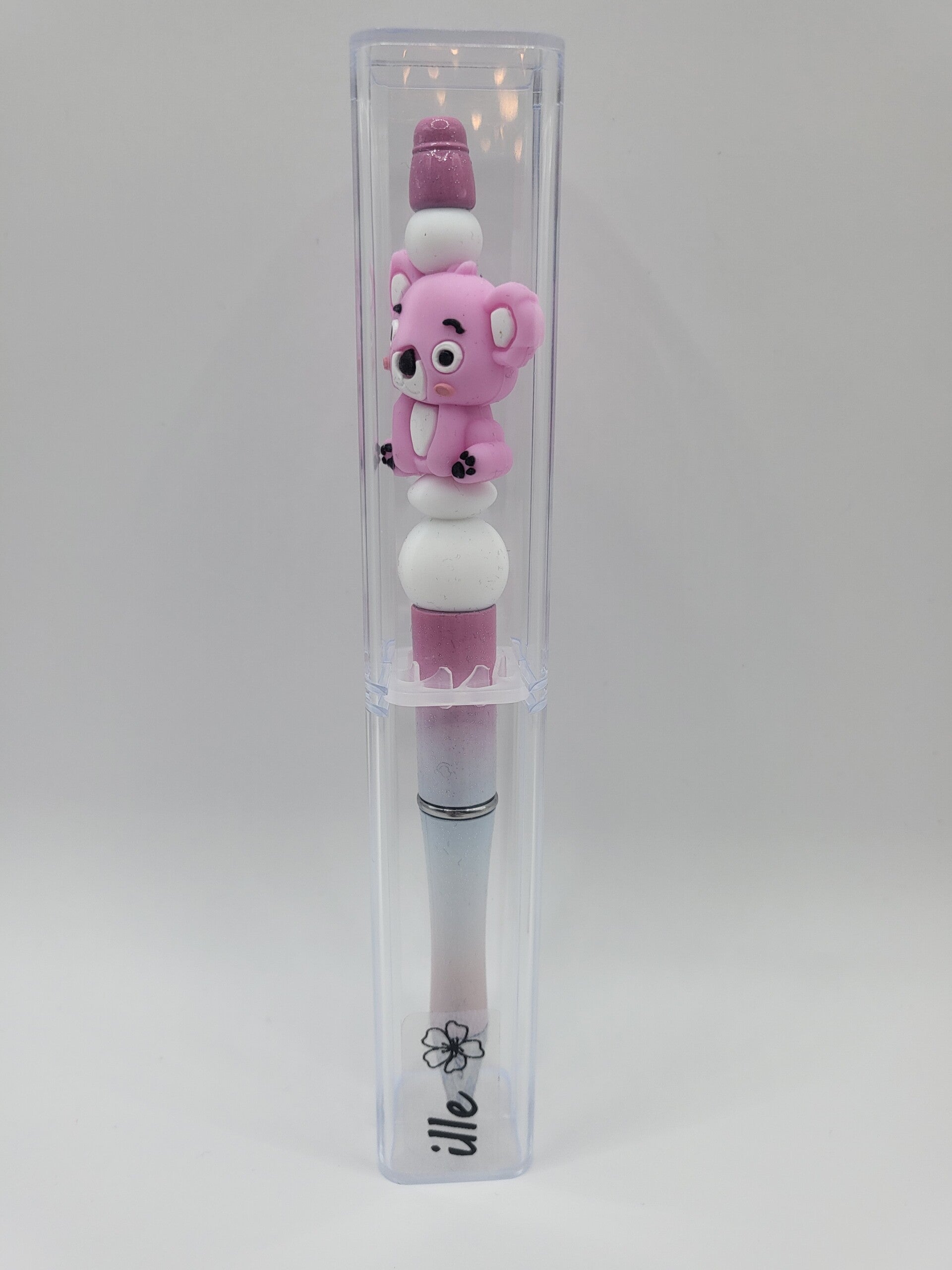 Pen met koala-beertje in fuchsia-roze en wit.