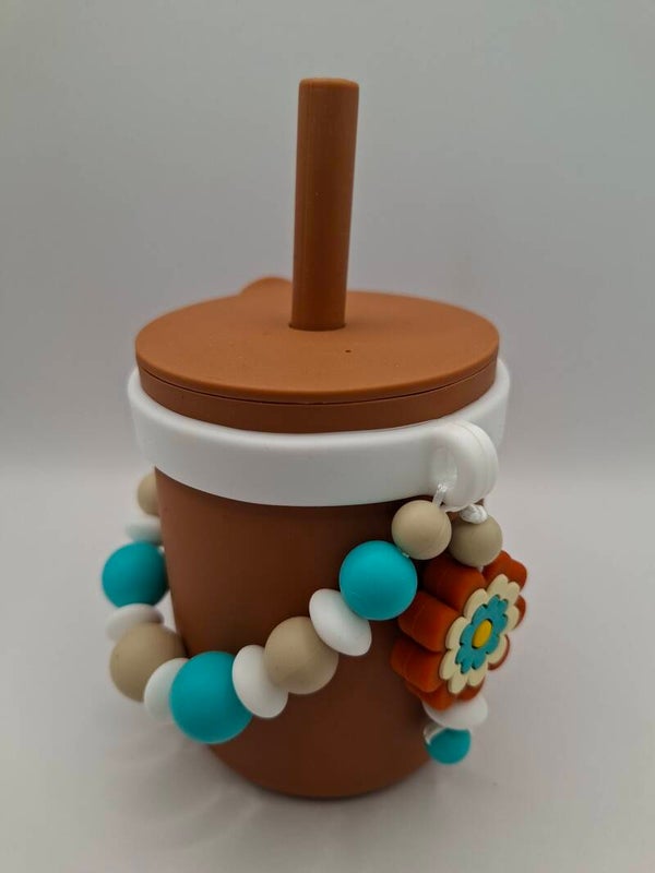 Silicone beker in roest kleur, met witte afneembare silicone sier-ring