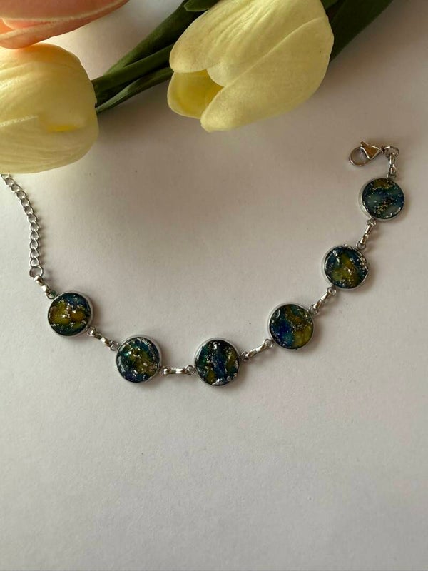 Armband; silberfarben; blau-gelb