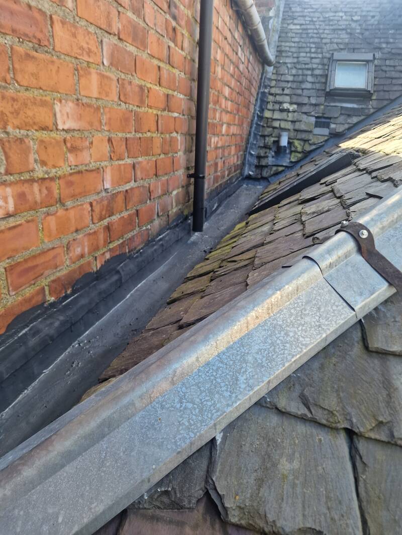 Leadwork repair to slate roof in Perthshire
