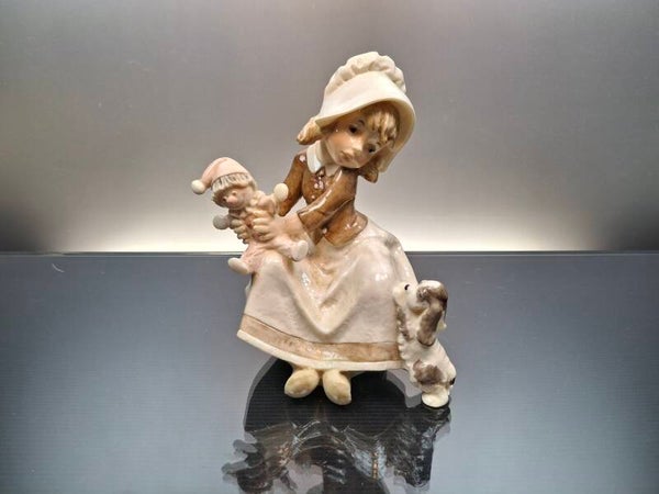 Figurine of girl with doll A. Santini