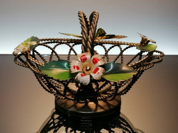 Woven metal basket with enamel flowers