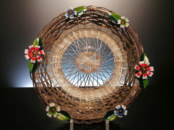 Woven metal basket with enamel flowers