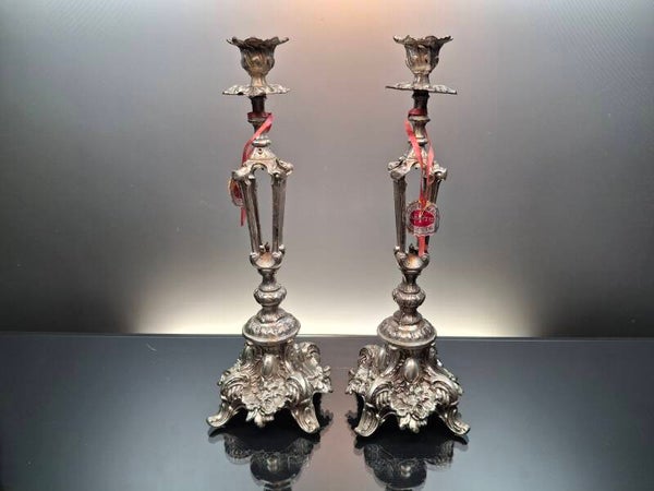 Baroque inspired silver-plated  candlesticks.