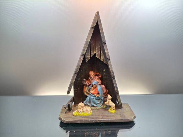 Wooden nativity scene with figures