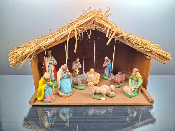 Wooden nativity scene with11 plaster figures