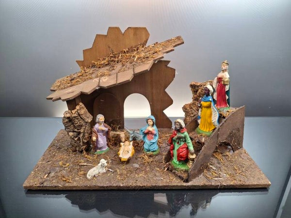 Wooden nativity scene with figures