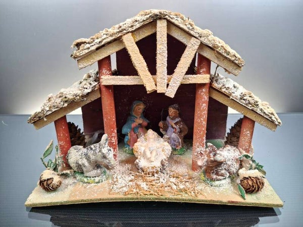 Wooden nativity scene with figures