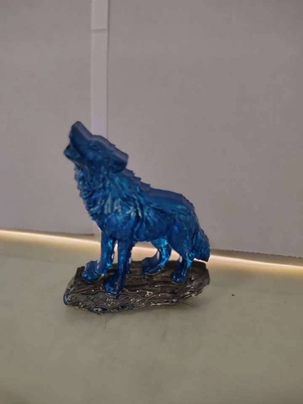 blue wolf on stone