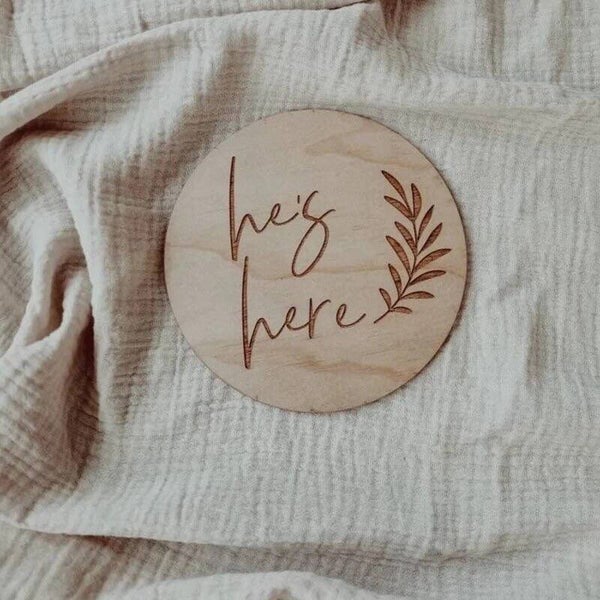 He’s here floral plaque