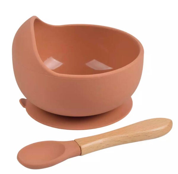 Deep orange bowl and spoon