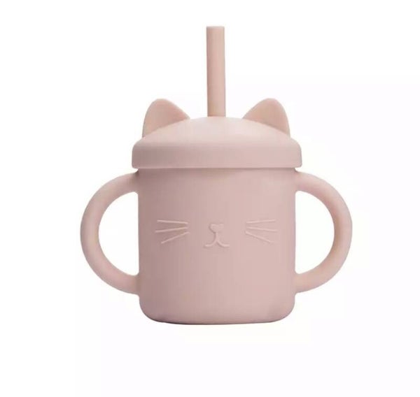 Pink silicone sippy cup