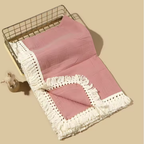 Dusty pink fringe muslin blanket