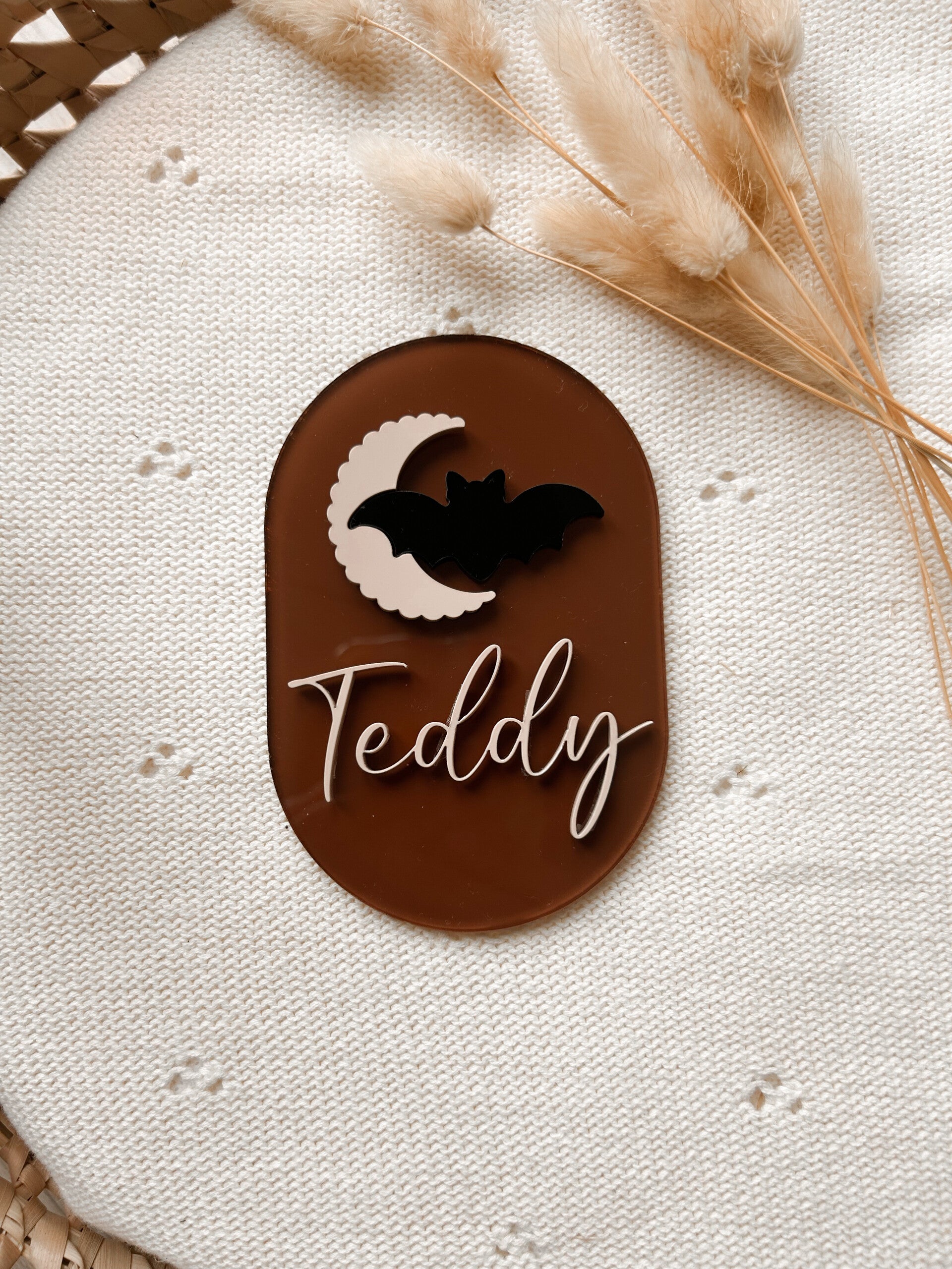 Oval moon and bat name