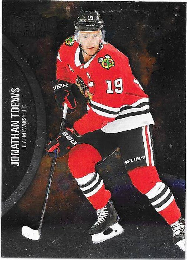 2021-22 SkyBox Metal Universe #71 Jonathan Toews , Chicago Blackhawks