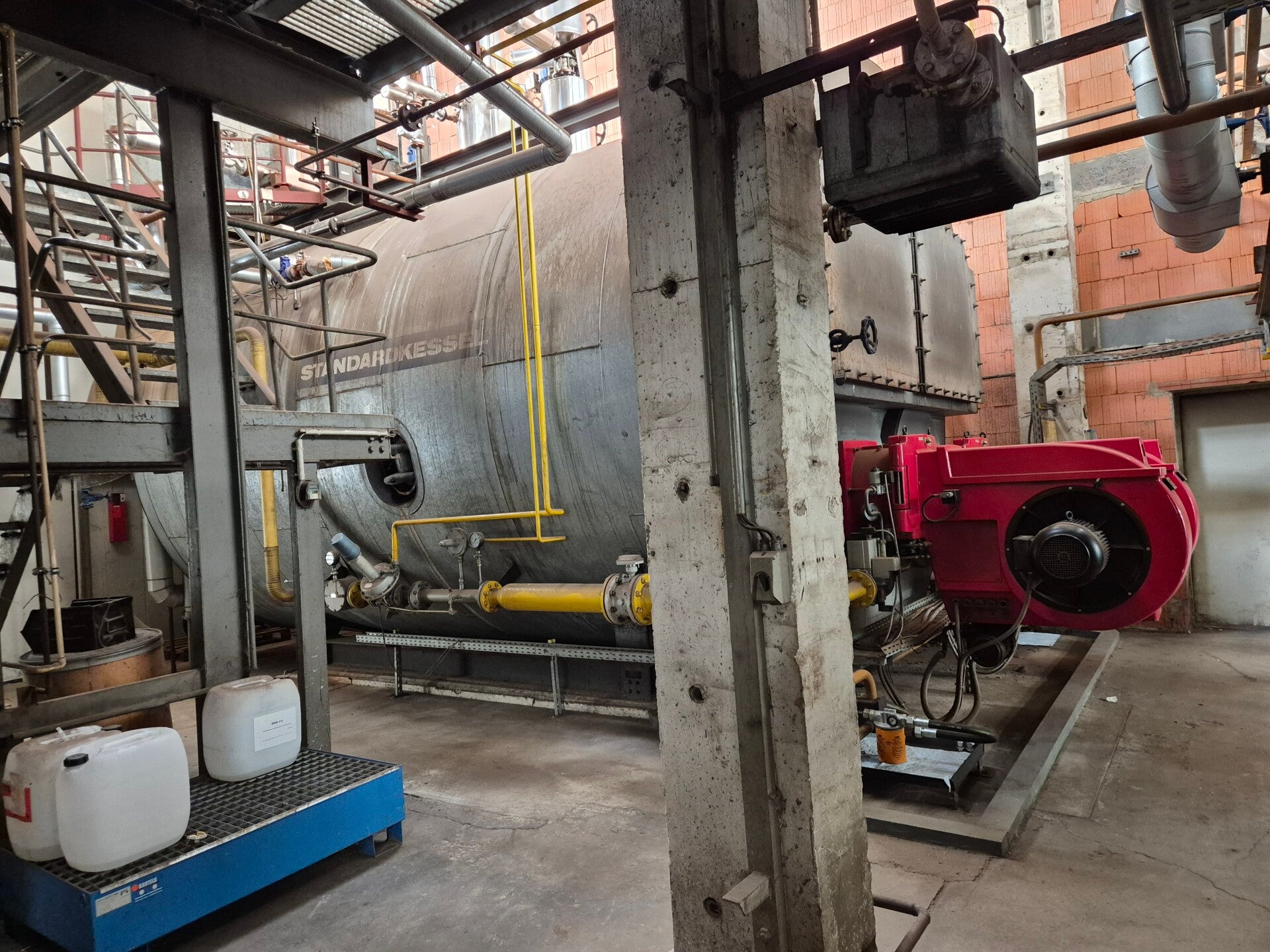 Standardkessel 20 t/h gas and oil steam boiler in installed condition, with burner and gas pipework