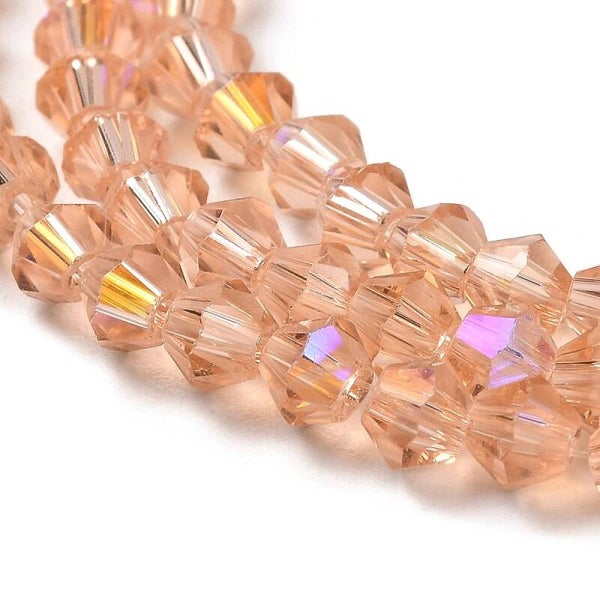 Bicone glaskralen roze 4 x 4 mm | Streng ca. 75 stuks