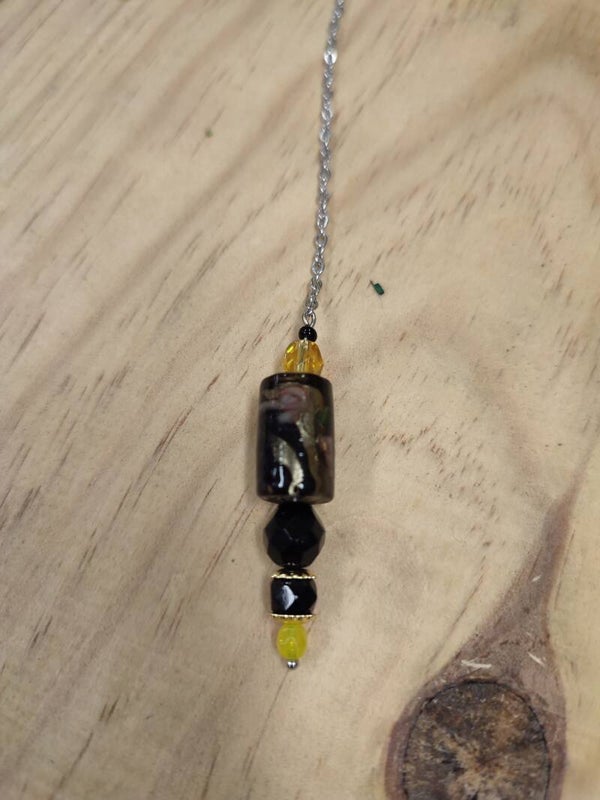 Pendule fait mains