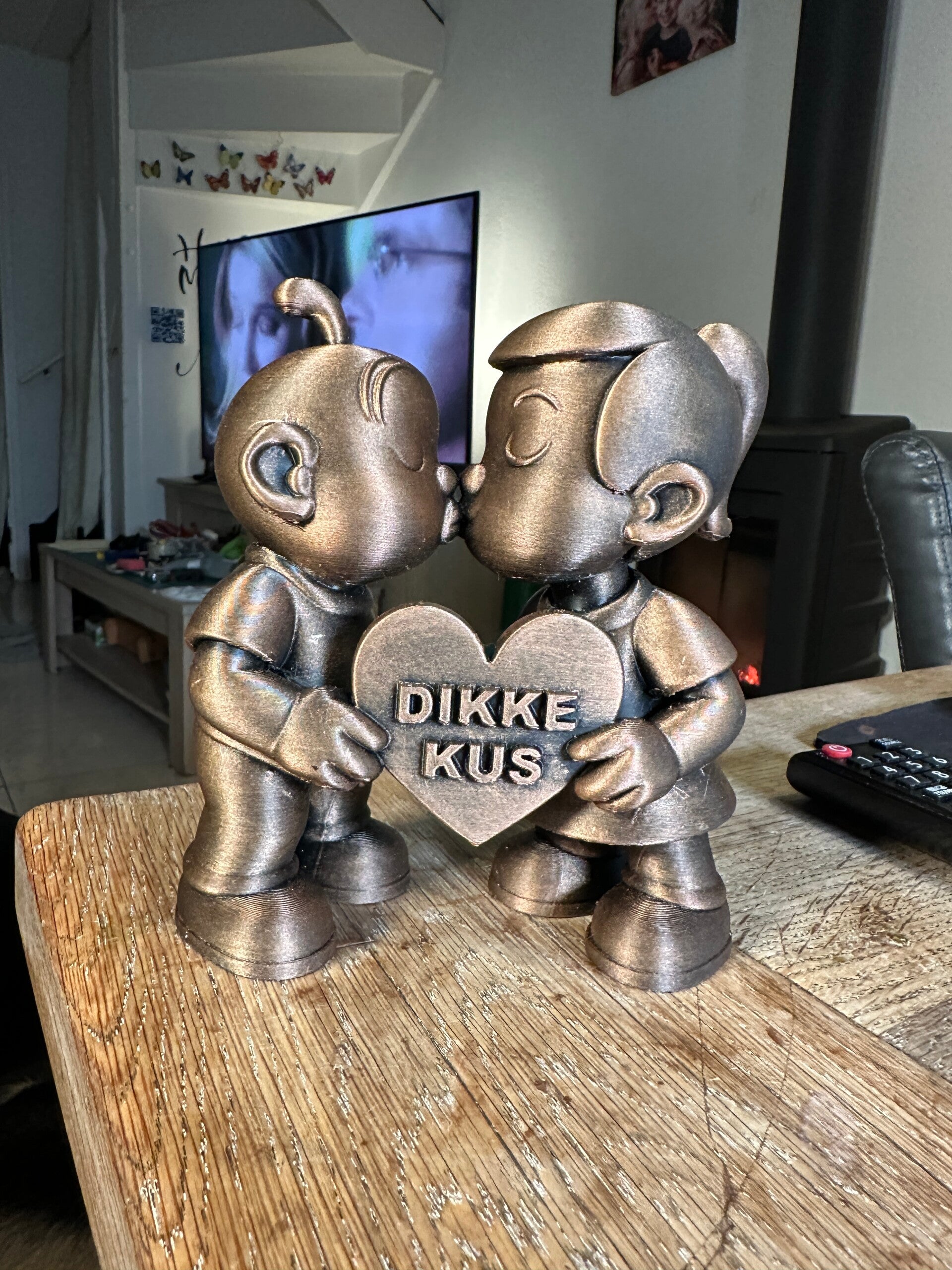 De dikke kus beeldje