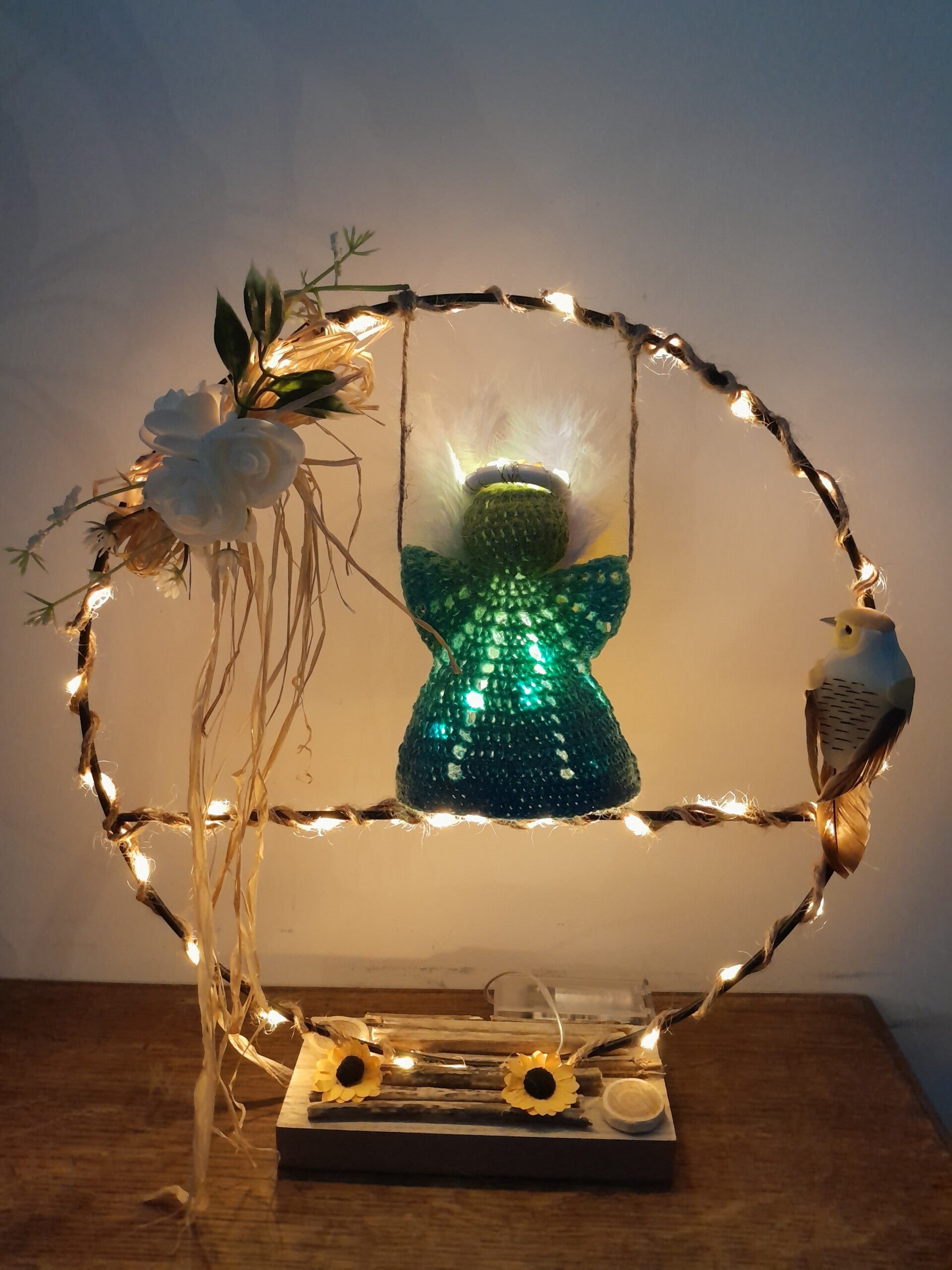 Ange sur balançoire