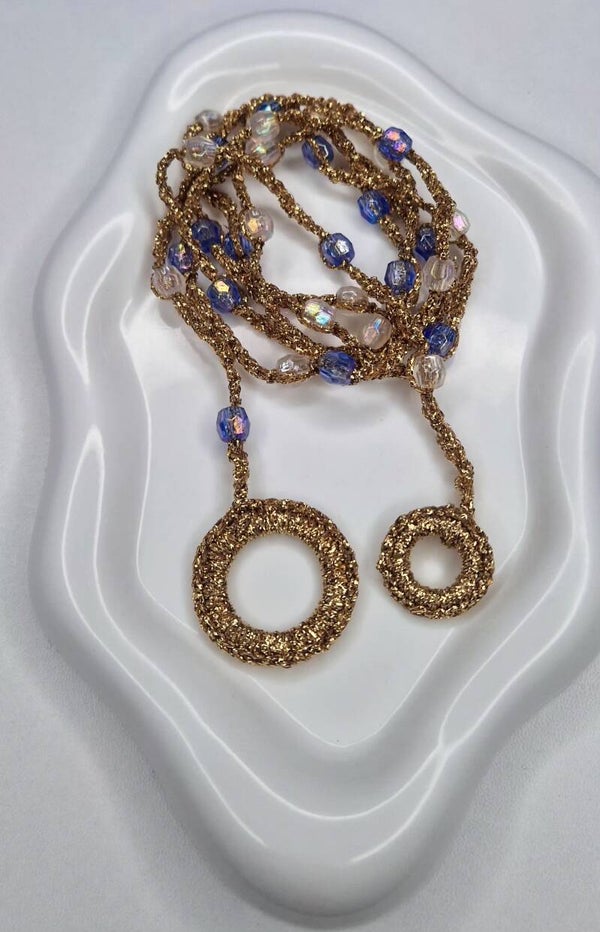Aurelia – Golden Statement Necklace with Iridescent Blue & Pearl White Stones