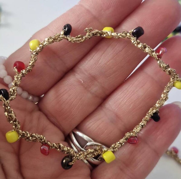 Handmade bracelets crafted with gold thread and colorful details — delicate, elegant, and perfect for every style. Each piece is crocheted with love and made unique through its vibrant color combinations. 💛🌈