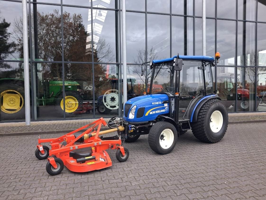 New Holland Boomer 35 + frontmaaier