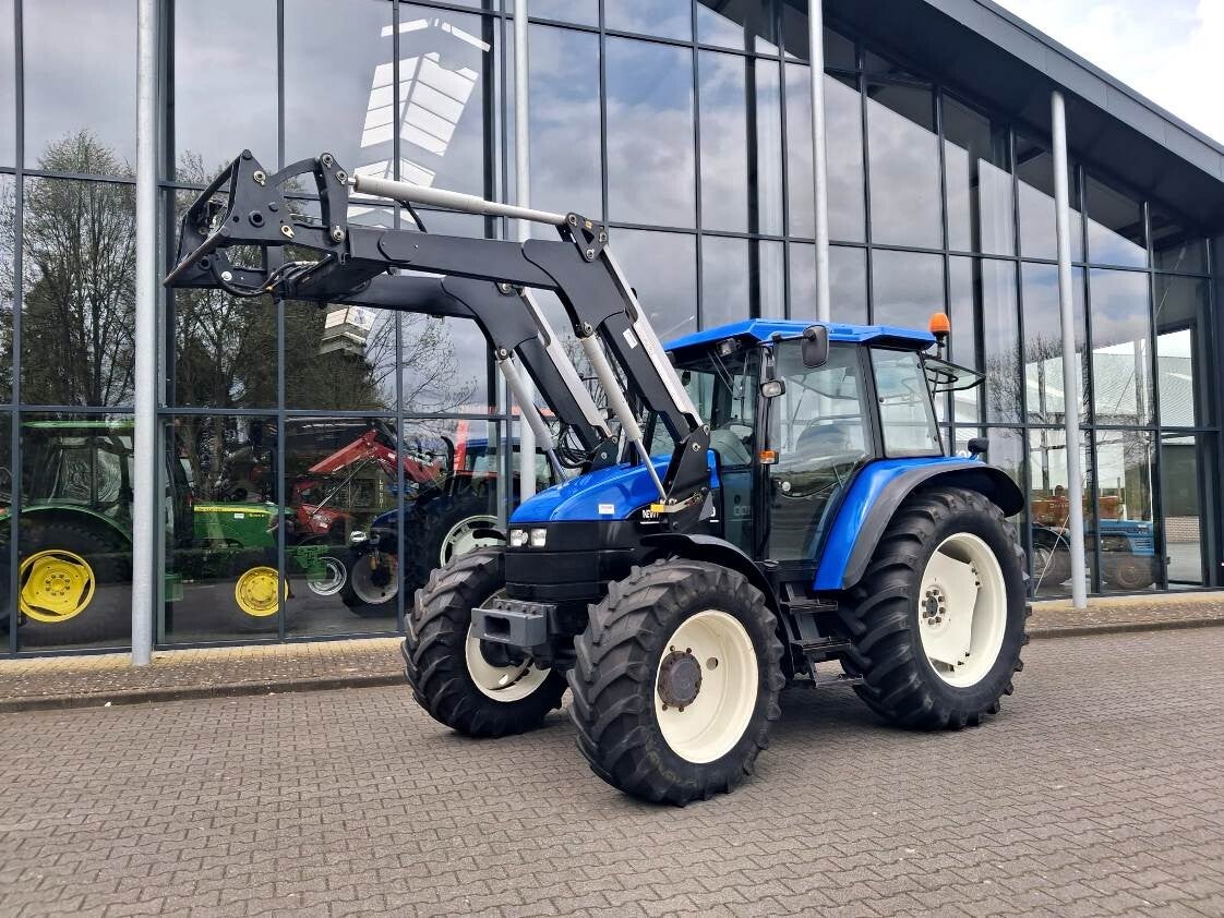 New Holland TS 100SLE + frontlader (6200u)