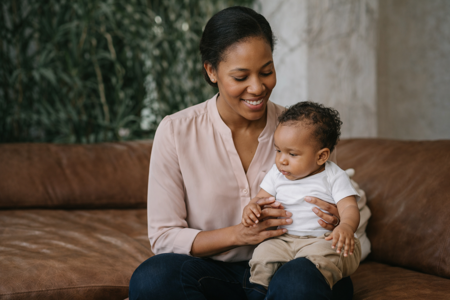 Professional African nanny caring for infant at home – childcare services in Nairobi