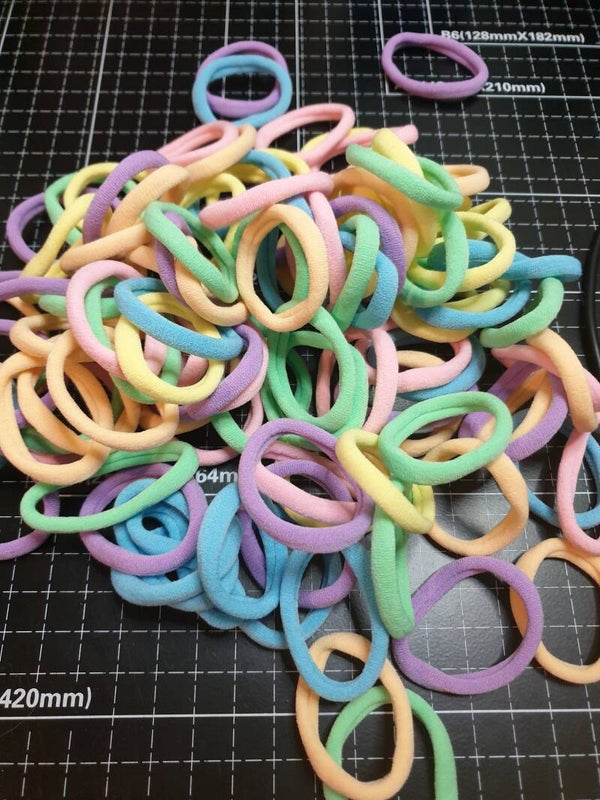 Pastelkleurige jersey haarstiekjes – 12 stuks