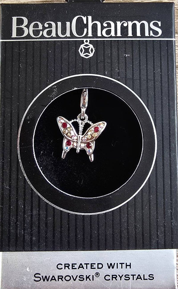 Bedel hanger in de vorm van een vlinder. Ingelegd met swarovski.