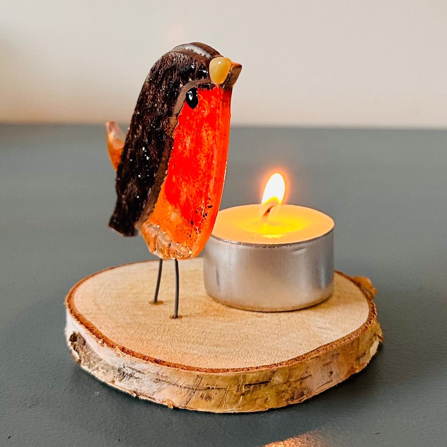 Roodborstje met bruin en amber