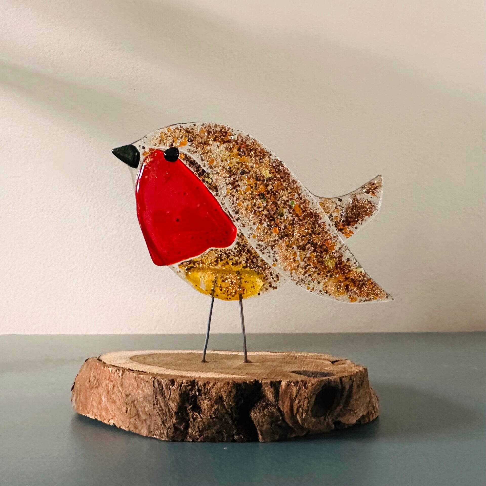 Roodborstje met gele buik