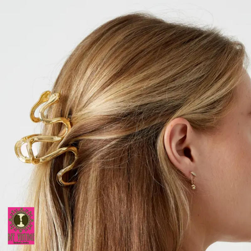 Grote haarspeld met goud & zwarte accenten