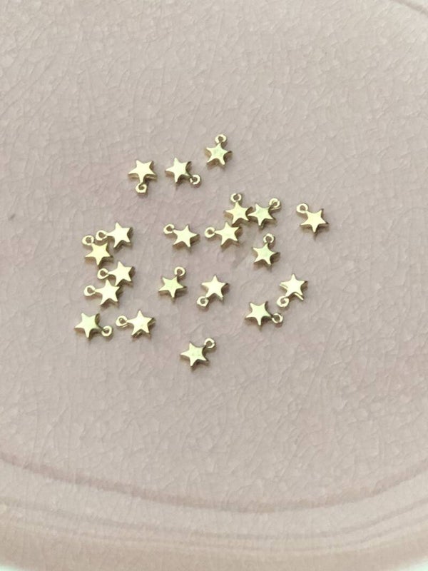 Ster metaal bedel goud