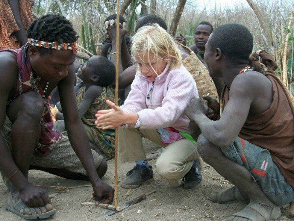 Hadzabe teaches the children how to make fire