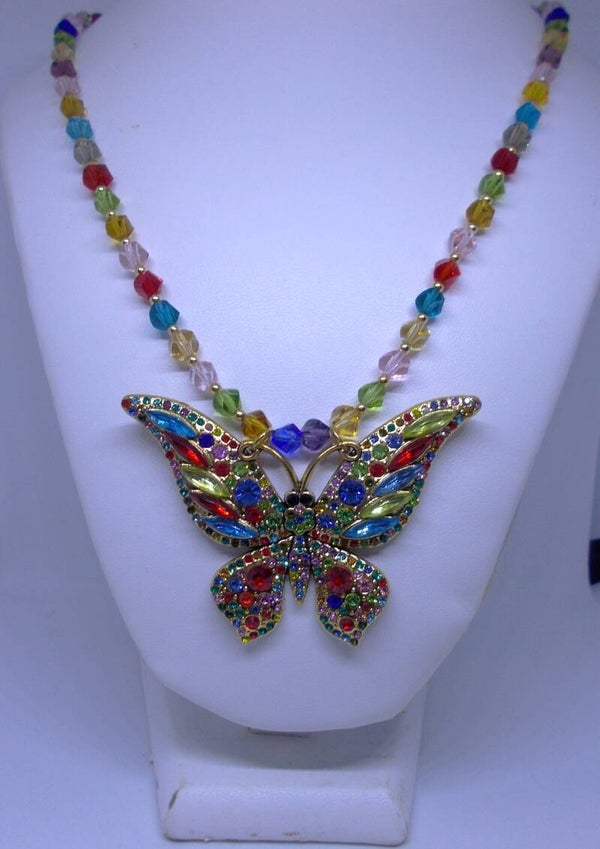 Colorful rhinestone butterfly and crystal necklace.