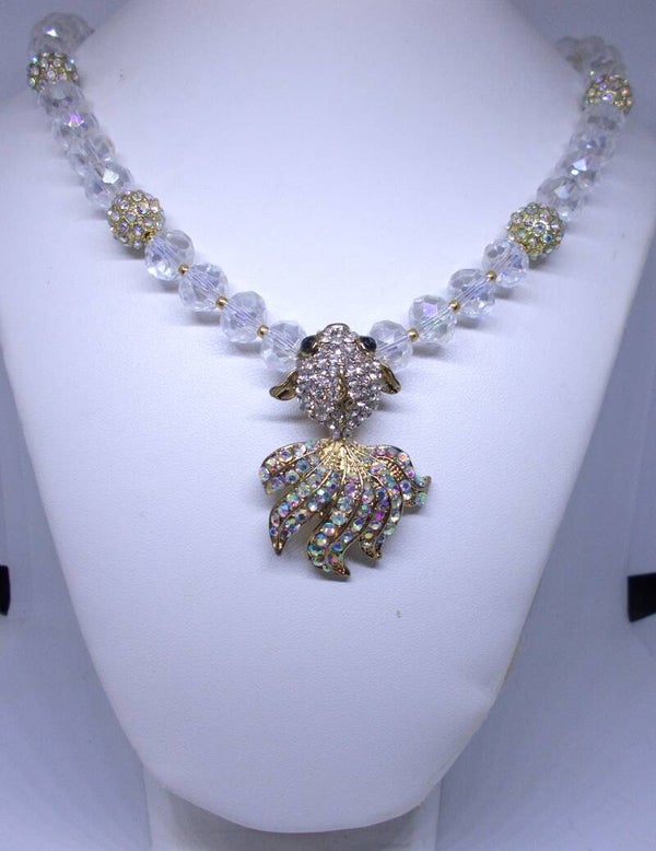 Rhinestone goldfish and crystal necklace.