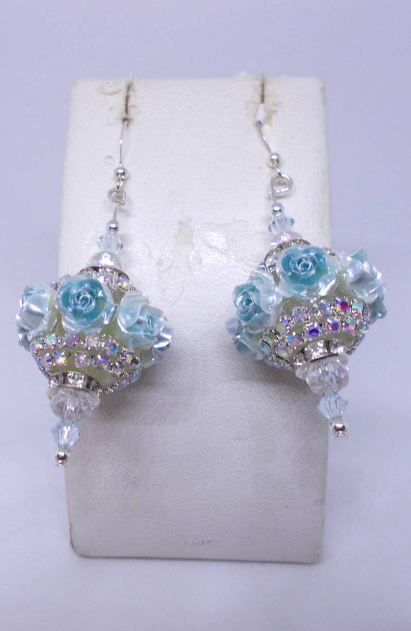 Blue rose and rhinestone earrings.