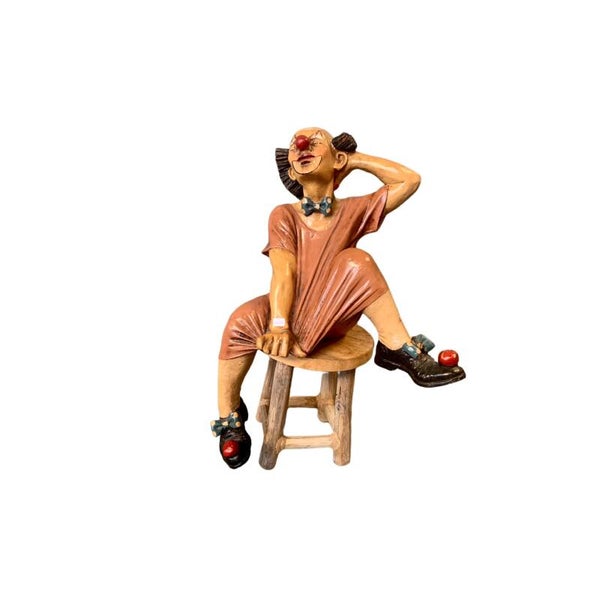Clown Op Een Houten Kruk | Clowns Beeld