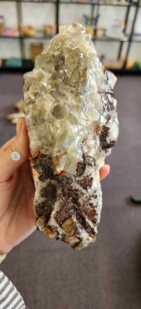Regenboog Calciet met druzy hematiet uit Mexico